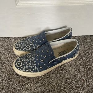 blue patterned slip on vans